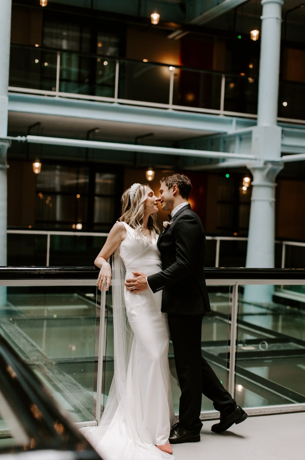 A bride and groom kissing